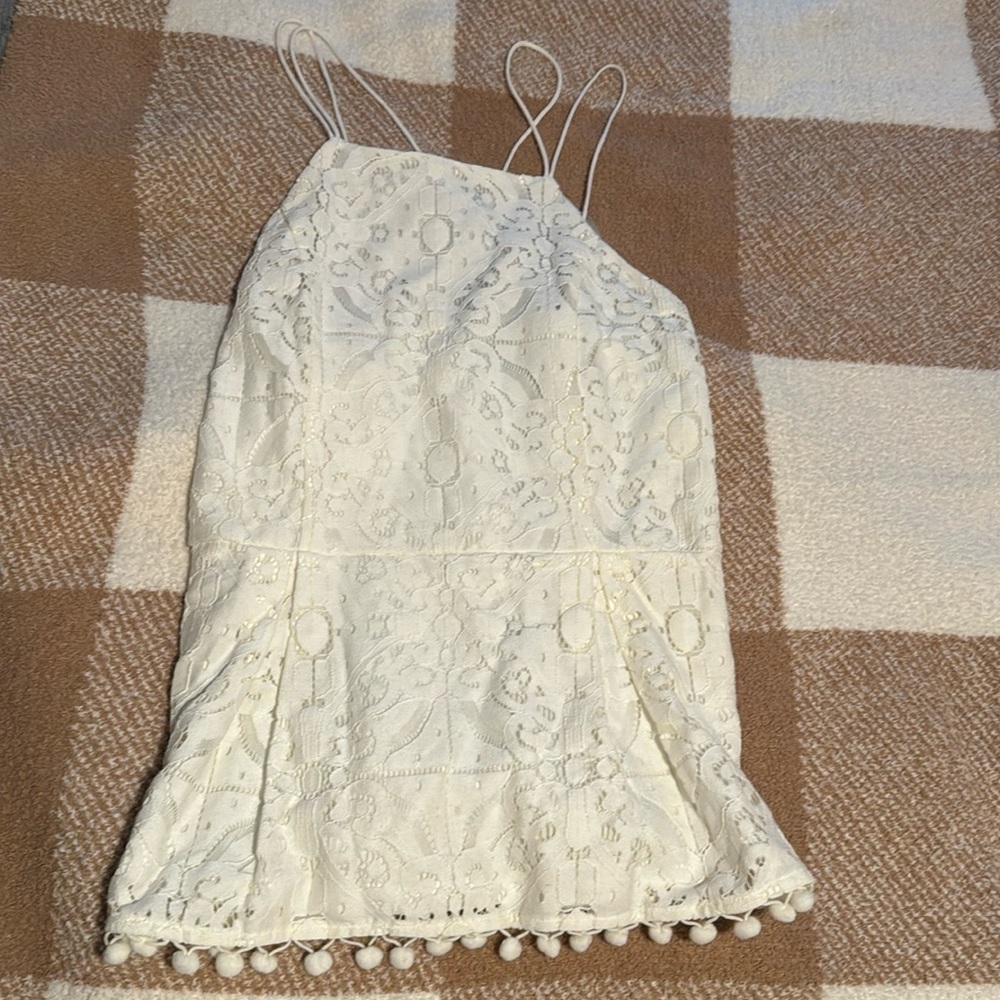 White pom-pom top